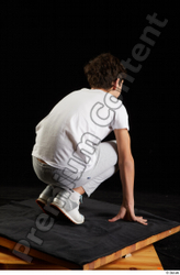 Whole Body Man White Sports Shirt T shirt Sweatsuit Kneeling Studio photo references